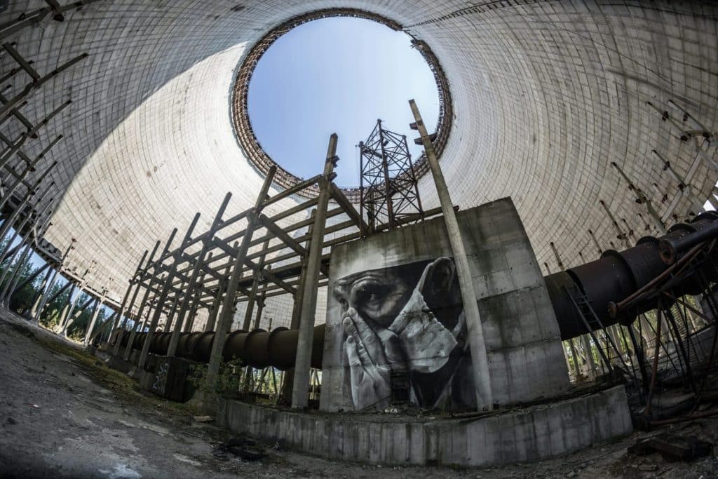 Fisheye lens captures graffiti inside an abandoned Chernobyl reactor.