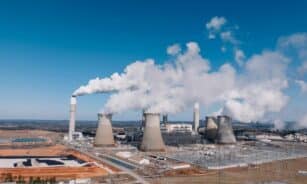 Aerial shot of an industrial power plant with smoke billowing in Euharlee, Georgia.