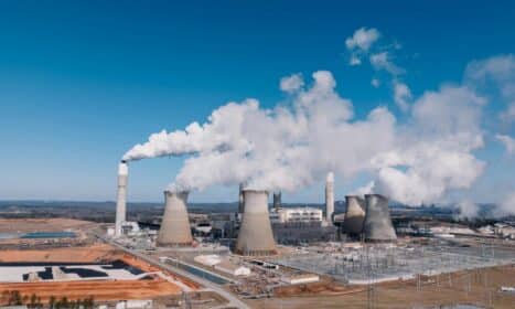 Aerial shot of an industrial power plant with smoke billowing in Euharlee, Georgia.