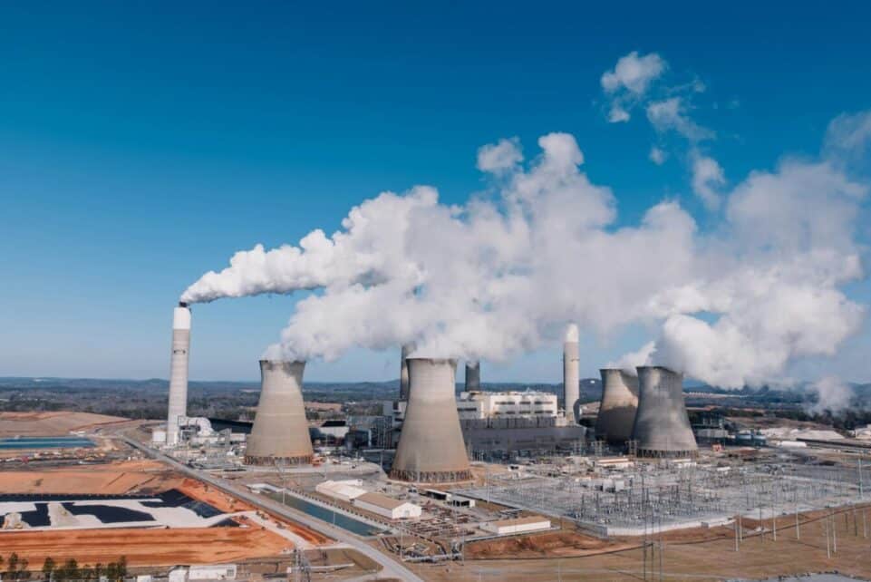 Aerial shot of an industrial power plant with smoke billowing in Euharlee, Georgia.