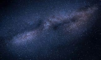 A breathtaking image capturing the Milky Way galaxy against a dark, starry night sky.