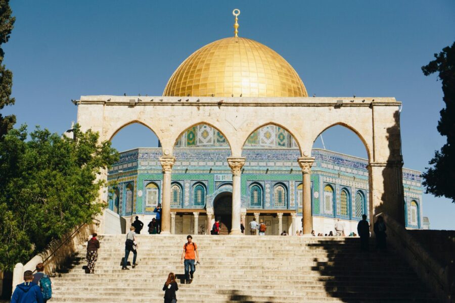 Stunning view of the Dome of the Rock in Jerusalem under clear blue skies.