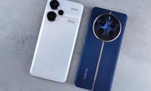 Two smartphones, one white and one blue, displayed on a textured grey background.