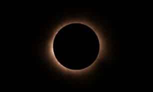 Stunning image of a total solar eclipse with glowing corona.