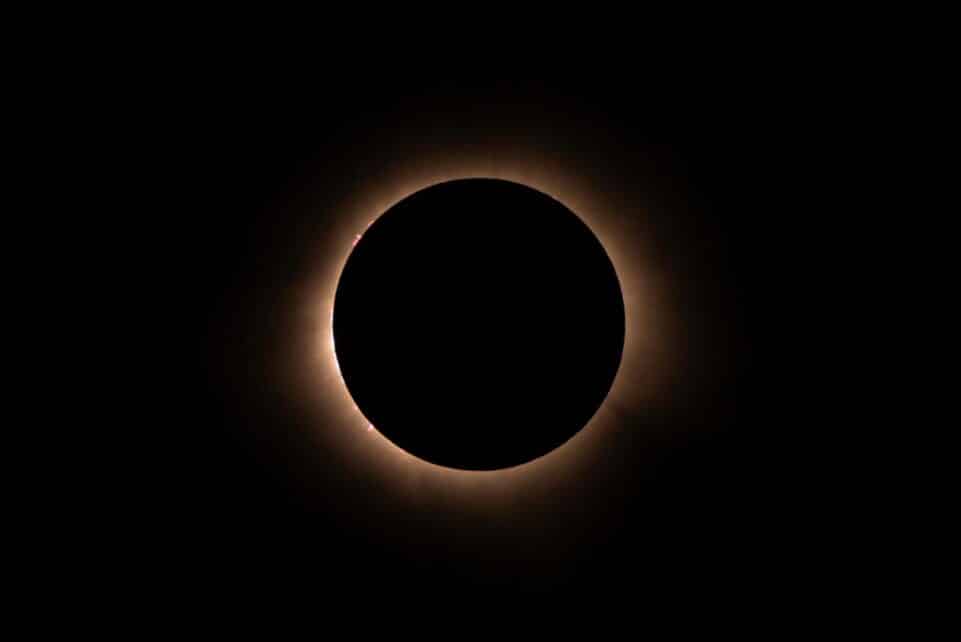Stunning image of a total solar eclipse with glowing corona.
