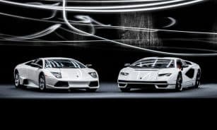 Elegant white Lamborghini Murcielago and Countach showcased with dynamic studio lighting.