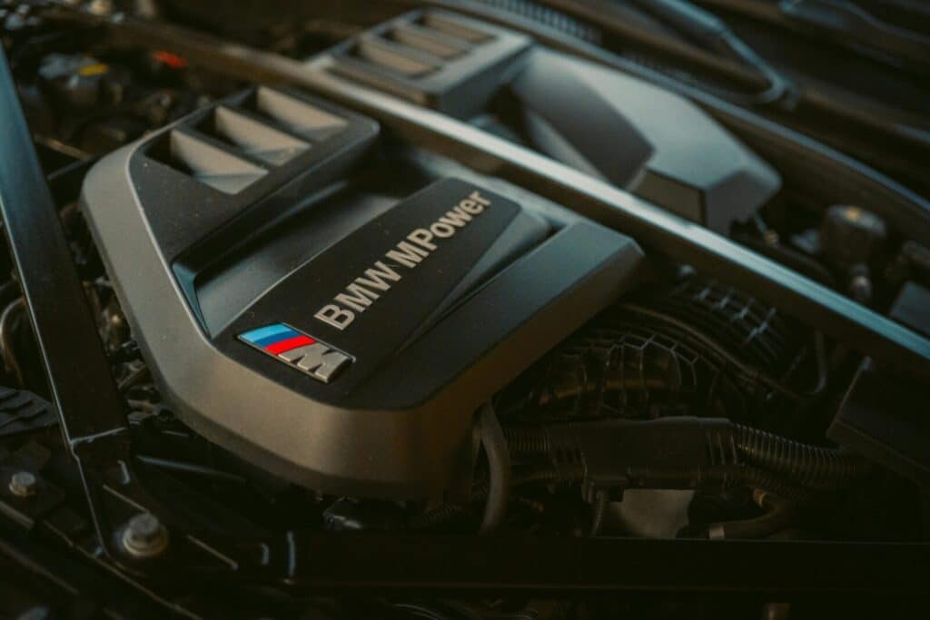 Detailed view of a BMW M Power engine block showcasing mechanical engineering.