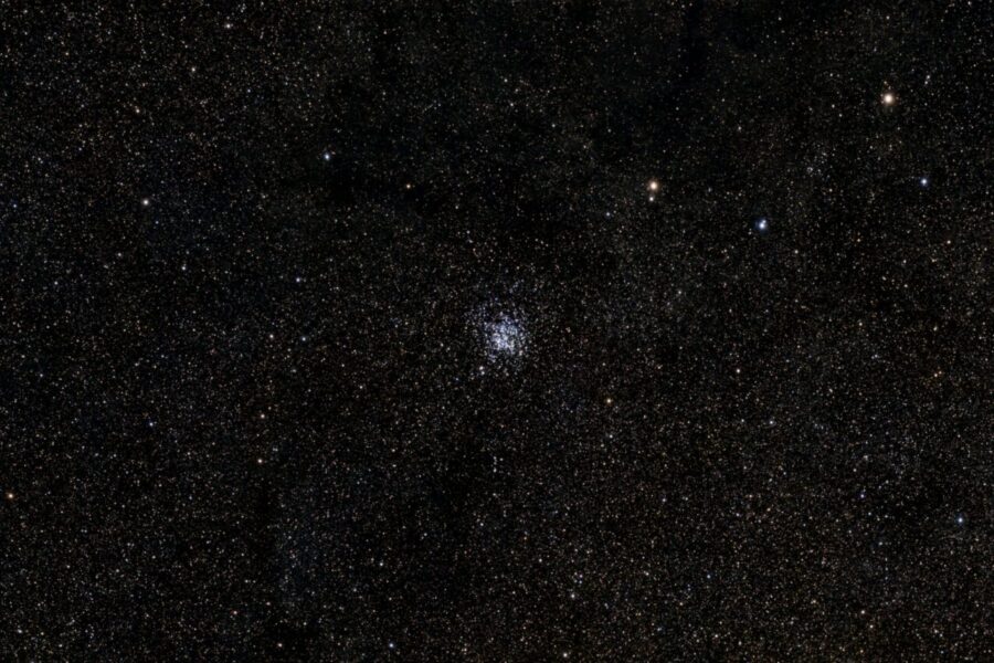 A breathtaking view of a dense star cluster in the night sky, showcasing countless stars.