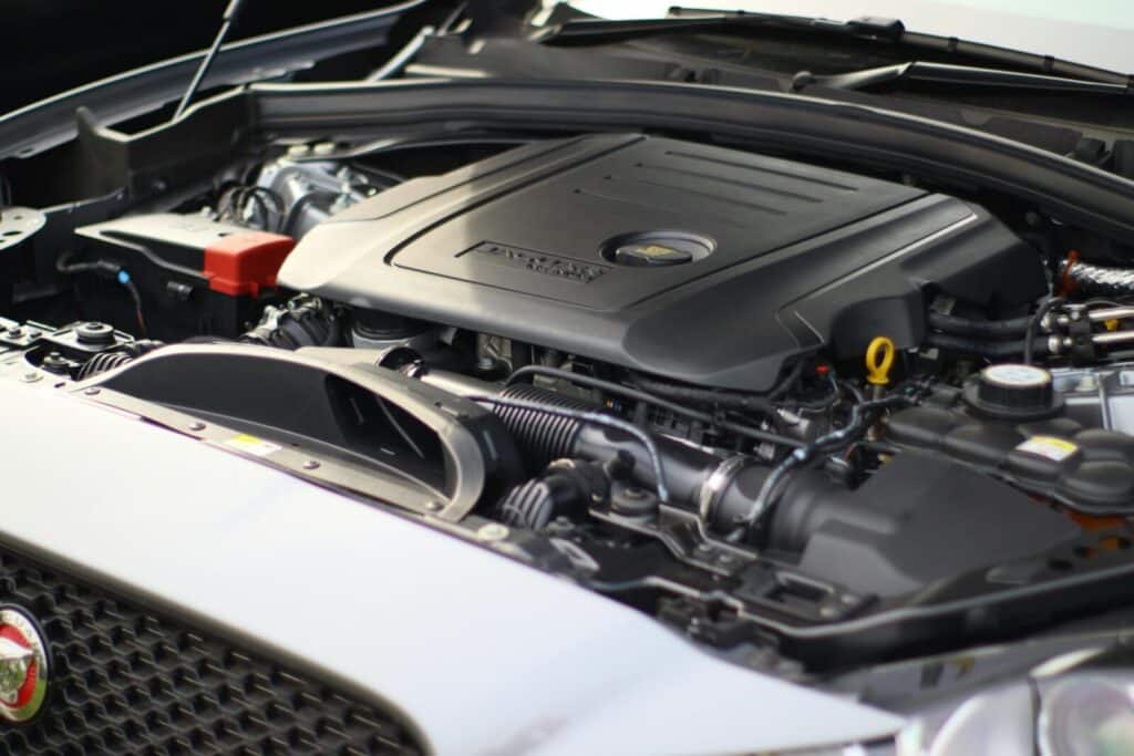 Detailed view of a car engine showing mechanics and components.