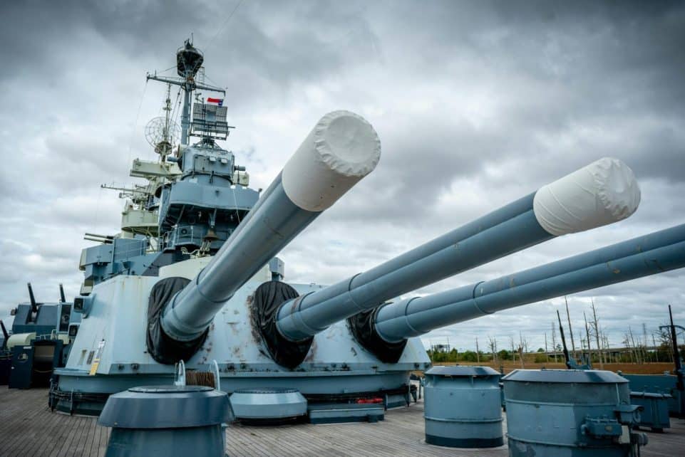 Iconic USS North Carolina battleship with massive turrets in Wilmington, NC.