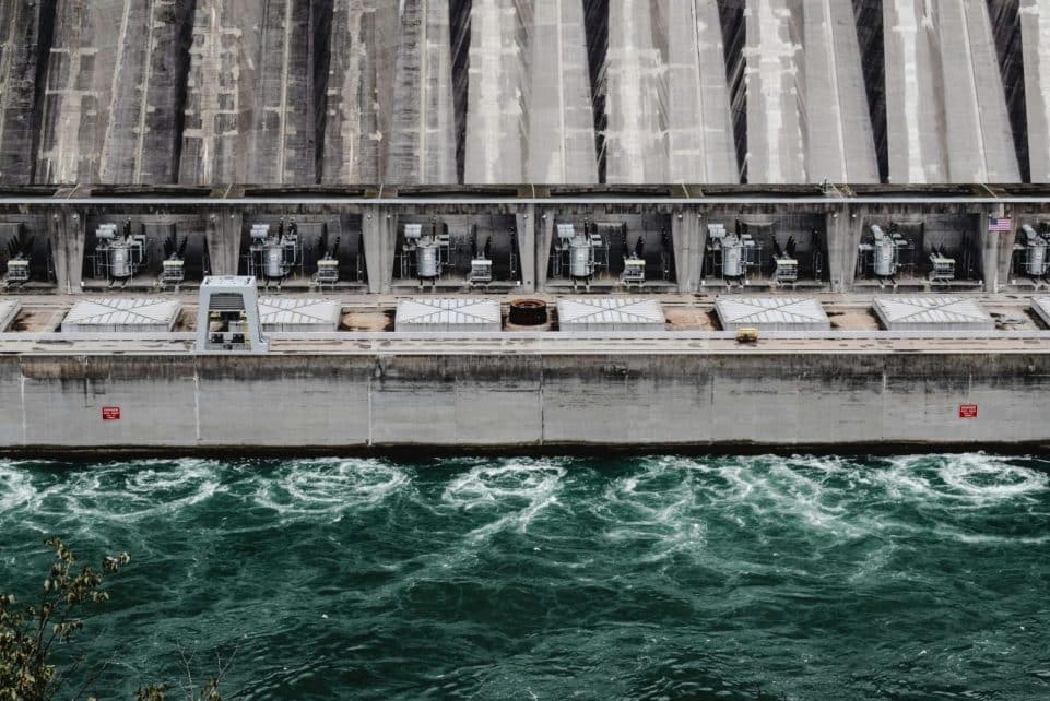 A stunning aerial view of the hydro power plant at Niagara Falls, showcasing engineering marvels and rushing water.