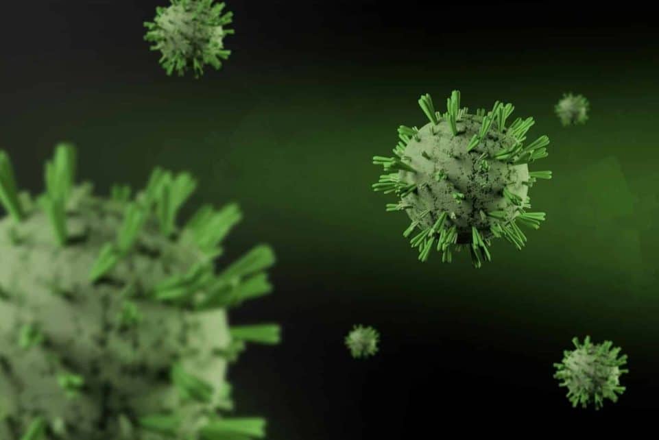 Close-up 3D render of virus particles floating on a dark green background, showcasing detailed virus structure.