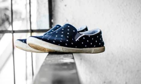 A close-up of stylish canvas sneakers with a star pattern, perfect for casual wear.