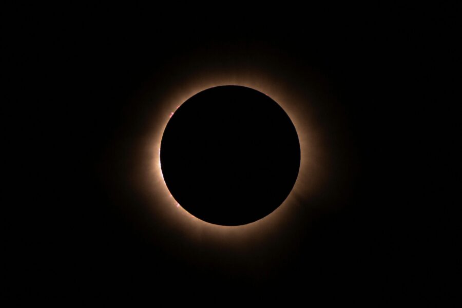 Stunning image of a total solar eclipse with glowing corona.