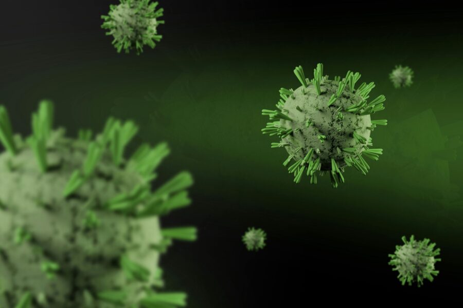Close-up 3D render of virus particles floating on a dark green background, showcasing detailed virus structure.