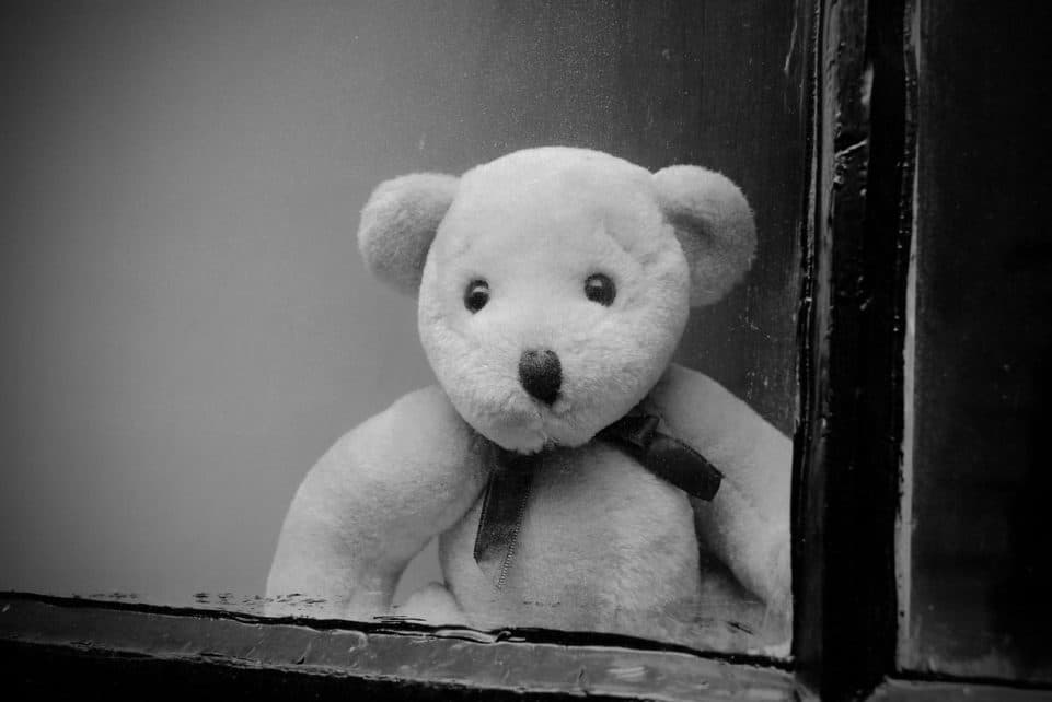 window, glass, dirt, dust, teddy, teddy bear, blackboard, abandoned, alone, sad, old, toy, baby, child, background, black, white, gray alone, gray blackboard