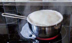 boiling over of milk, ceramic hob, hotplate, pot, milk, foaming milk, branded milk, annoying, to forget, dementia, forgetfulness, reflection, odor, milk splash, steam, boiling milk, hot, milk, milk, milk, milk, milk, boiling milk, boiling milk, boiling milk
