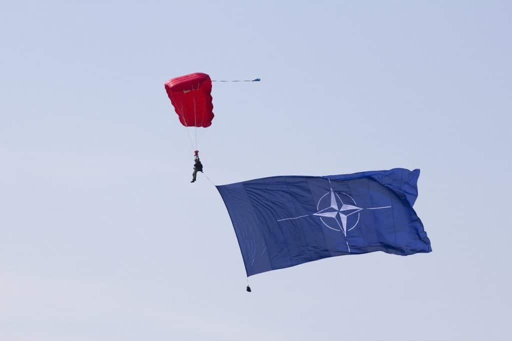parachute, parachutist, the sky, skydiving, jump, the military, flying, person, nato flag, flag, nato, nato, nato, nato, nato, nato