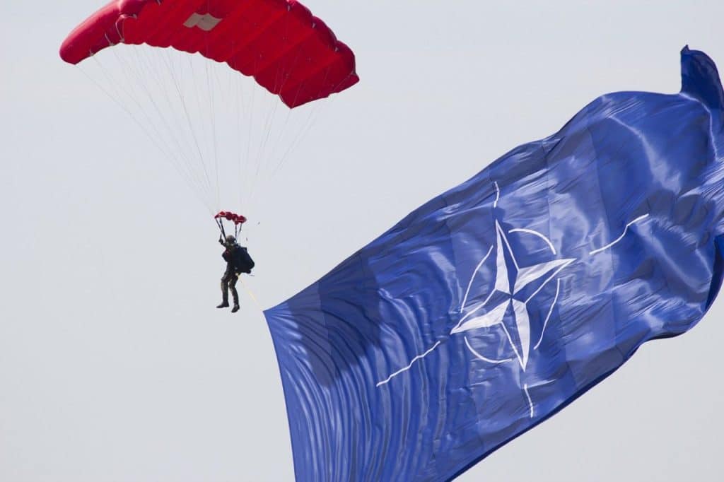 parachute, parachutist, the sky, skydiving, jump, the military, flying, person, nato flag, flag, nato, nato, nato, nato, nato, nato