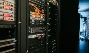 a rack of servers in a server room