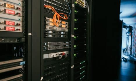 a rack of servers in a server room