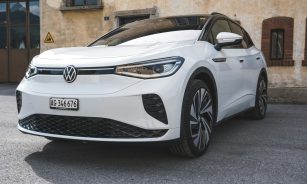 white porsche 911 parked on road during daytime