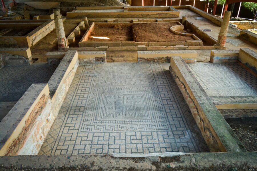 A group of wooden benches sitting next to each other