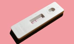 white pregnancy test showing 1 red line