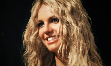 a close up of a person with blonde hair