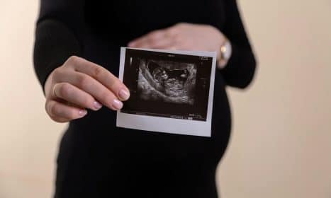 a person holding a tablet