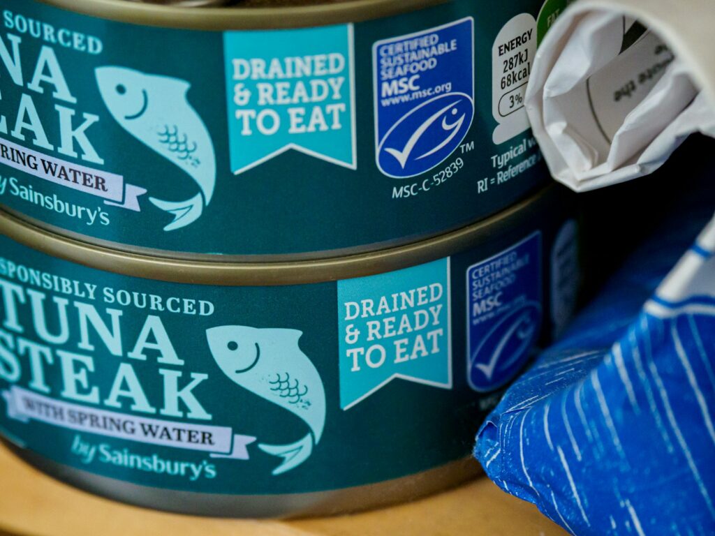 blue and white labeled can