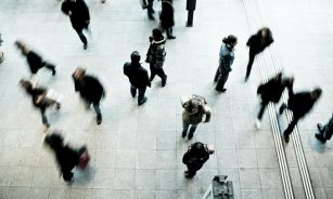 people walking on grey concrete floor during daytime