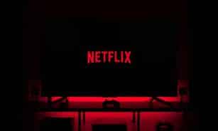 flat screen television displaying Netflix logo