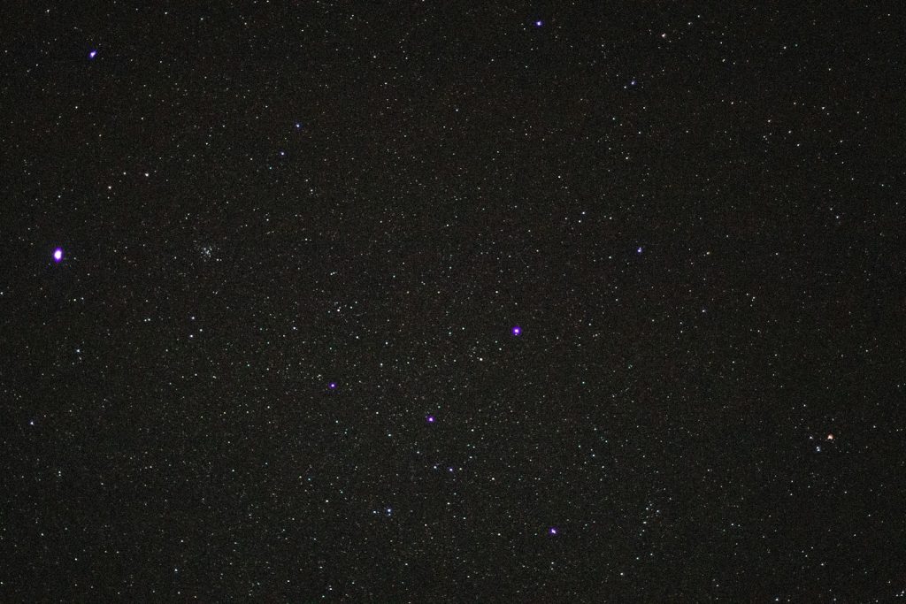 a starry night sky with a few stars