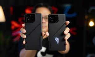 A woman holding two samsung phones in her hands