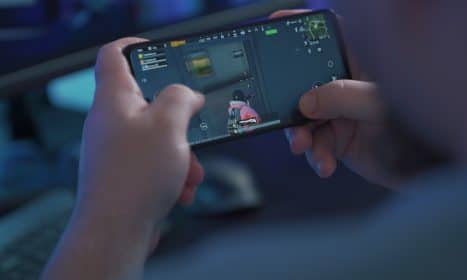 person holding black android smartphone