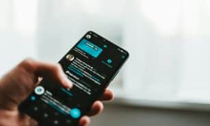 person holding black android smartphone