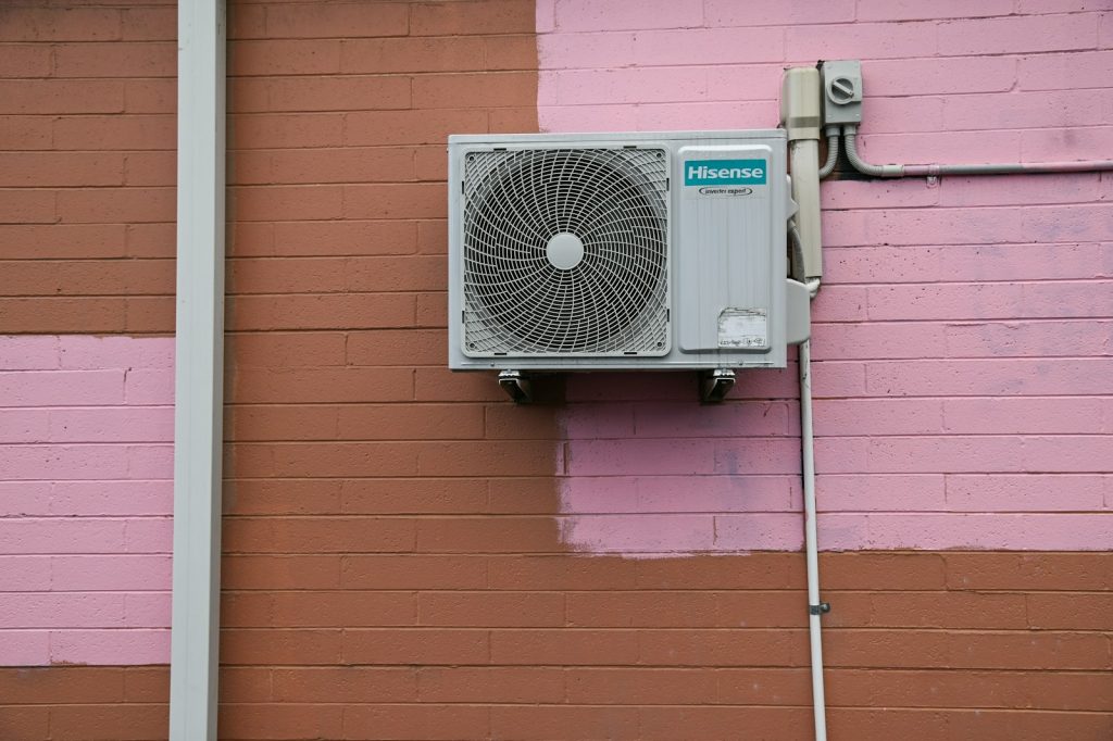 A air conditioner mounted to the side of a building