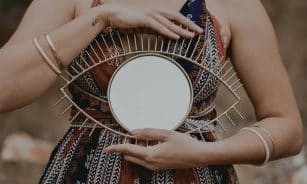woman in blue and white floral dress