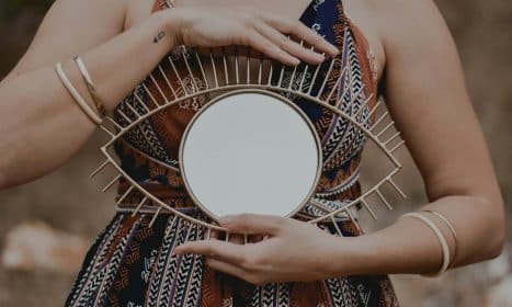 woman in blue and white floral dress