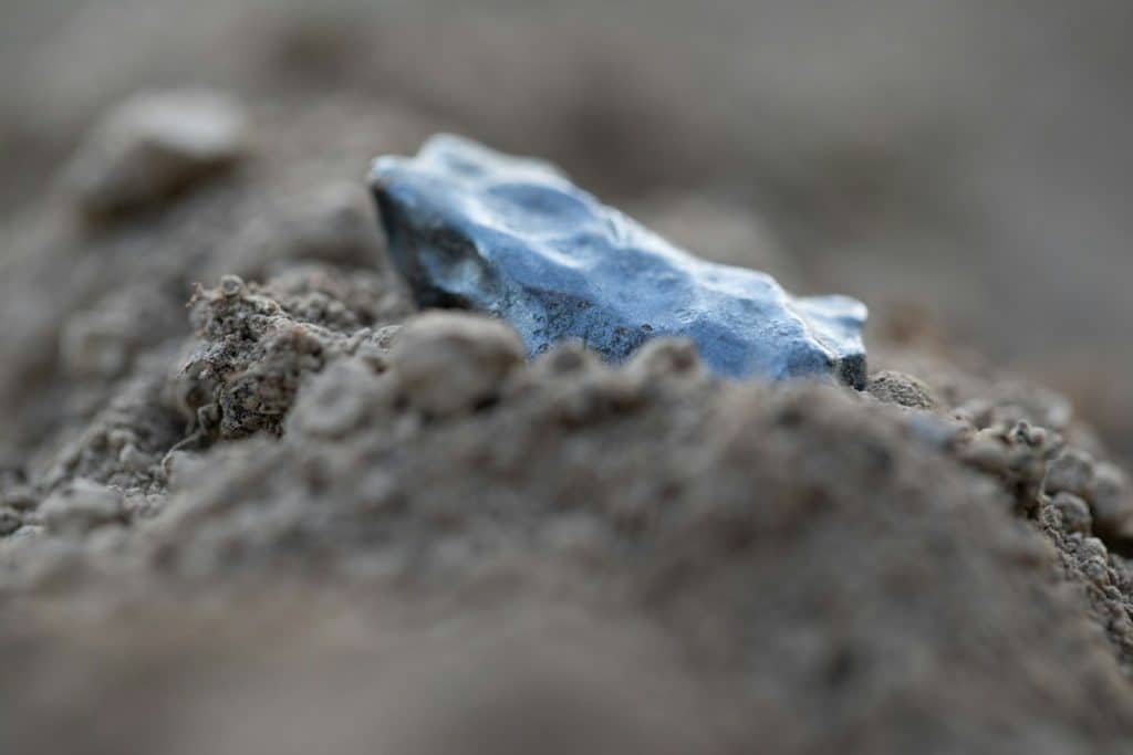 a blue and white rock