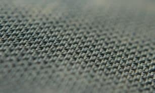 A close up view of a gray fabric