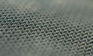 A close up view of a gray fabric