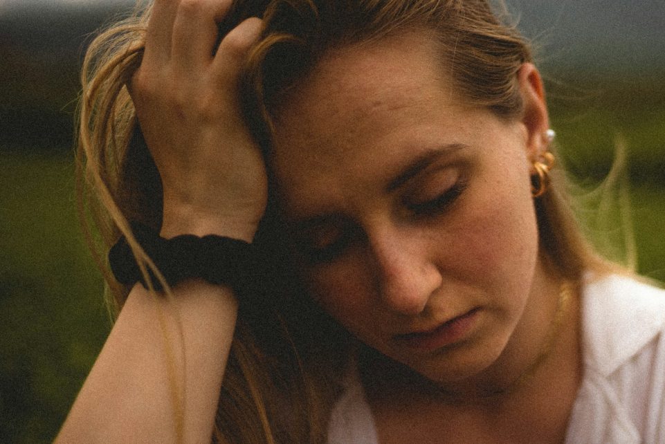 woman in white tank top