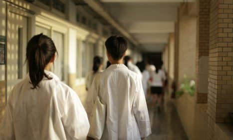 woman in white dress shirt