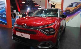 A red car on display at a car show