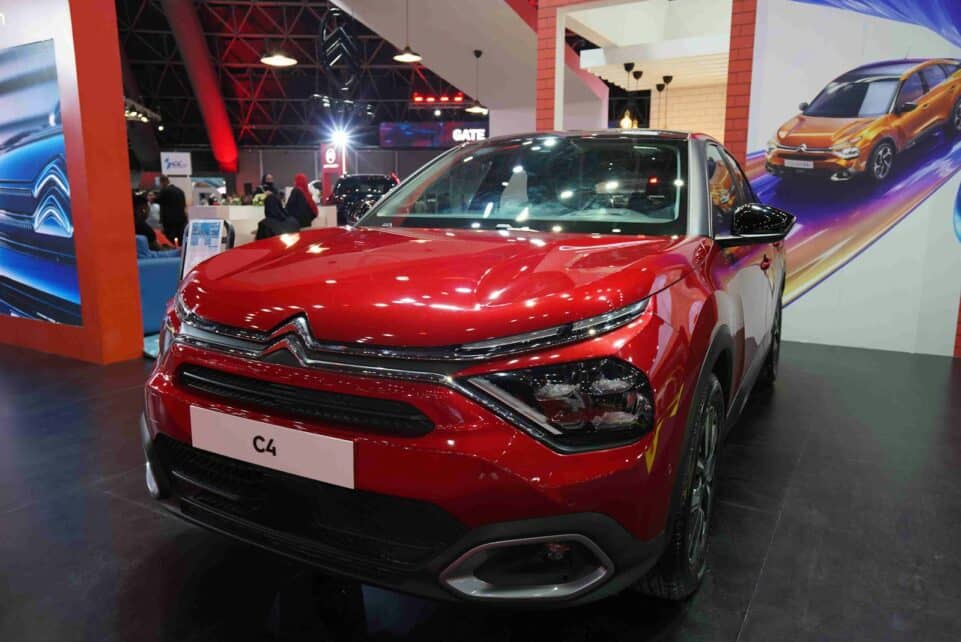 A red car on display at a car show