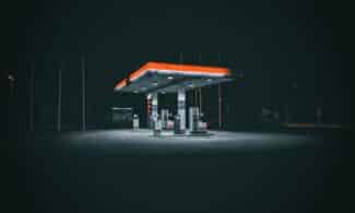 a gas station at night with no people around