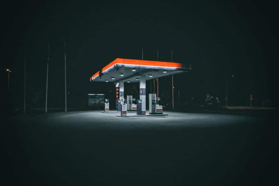 a gas station at night with no people around