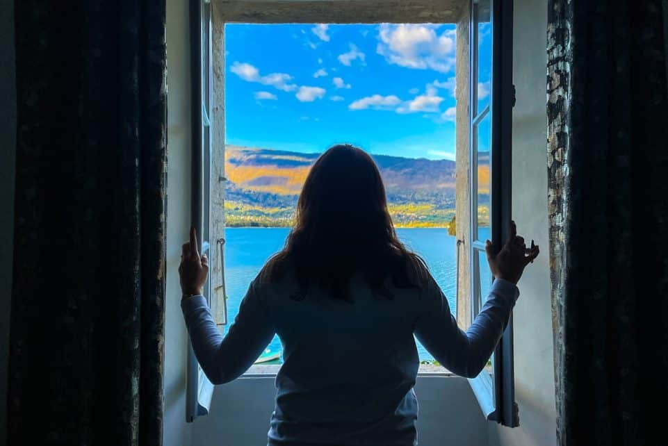 a person looking out a window